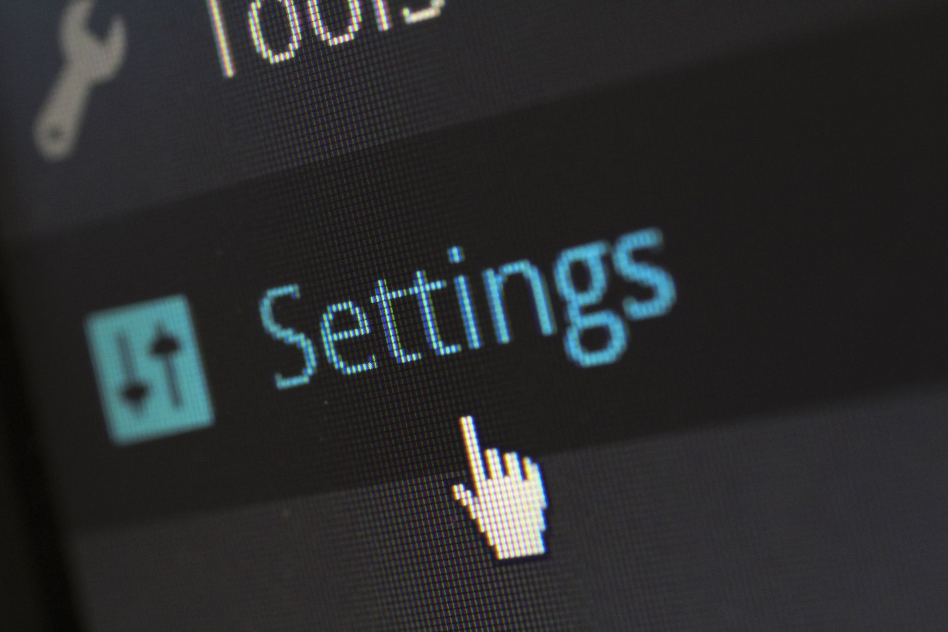 Close-up of a WordPress Settings menu on a computer screen with cursor hovering, representing SEO visibility configuration