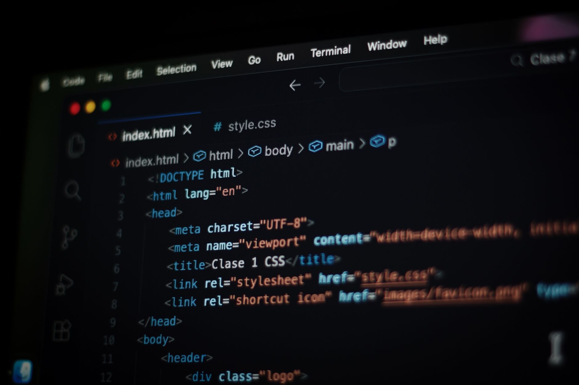 HTML title tag code visible in a dark-mode code editor, illustrating how title tags are written in page source