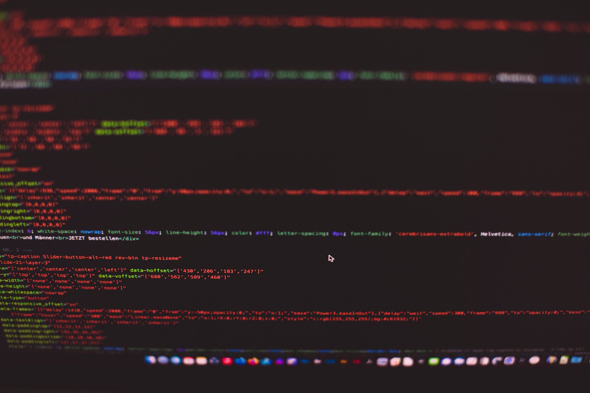 Colorful CSS and HTML code on a dark screen representing website performance and speed optimization