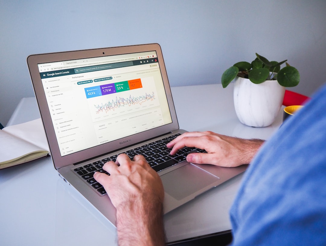 Person reviewing Google Search Console data on a laptop — WordPress SEO tutorial for higher Google rankings